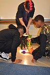 Natalie Beccera helps Wiley Elementary students test their solar car.