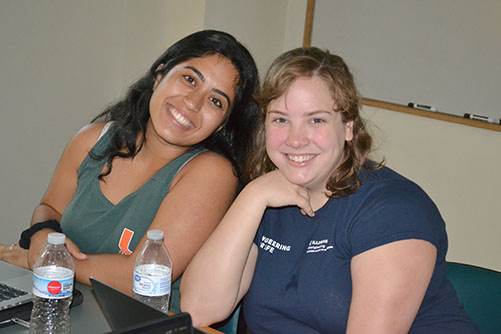 2019 Biomedical Imaging undergrads Disha Patel and Elizabeth Breen during a weekly meeeting where the undergrads were doing trial runs of their oral presentations.