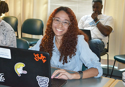 2019 Biomedical Imaging REU participant, Marisabel Colón Colón works on her presentation during a weekly Biomedical Imaging REU meeting.