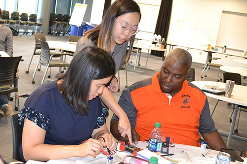 Elizabeth Ohr, Urbana High School Science teacher does the Logarithm activity with another educator.