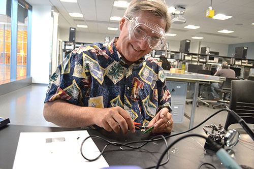 Mahomet-Seymour chemistry teacher Terry Koker enjoys doing the soldering activity.