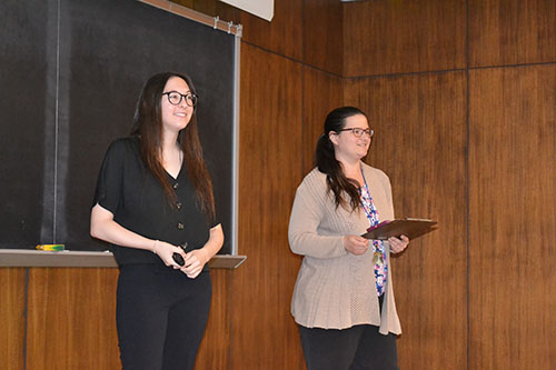 I-MRSEC REU participant Lauren Gorman (left) waits to answer questions as I-MRSEC Outreach Coordinator Pamela Pena Martin moderates a Q&A after Gorman's presentation.