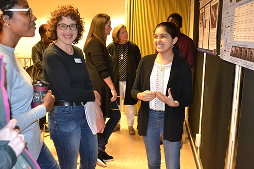 Neha Hebbar presents her research to the Champaign School Board.