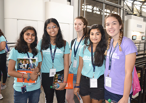 Sophomore Liz Boehning (right) serves as mentor to a group of freshman Electrical Engineering students.