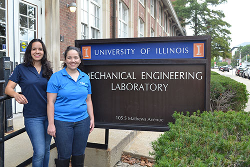 Val Laguna and Ann Zuzuly by the Mechanical Engineering Laboratory.