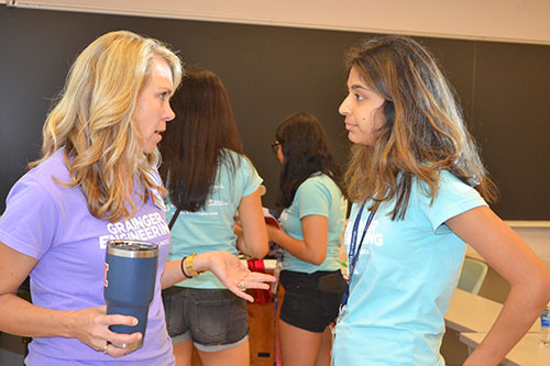 Angie Wolters chats with a freshman during one of the afternoon's advising sessions.