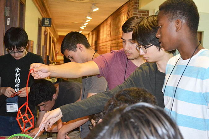 WYSE High School students experimenting with their bubble wands.