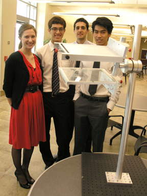Team Ramammogram shows the Raman Assisted Mammogram device they designed.