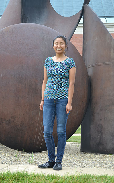 Adriana  Carola Salazar Coariti on Bardeen Quad outside of the Mechanical Engineering Lab.