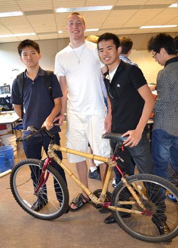 Better Bike Team displays their bamboo bike.