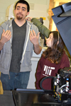 During the Next Generation School tour of the Ford Lab, MechSE grad student Kun Hyuck Lee (left) illustrates the type of model that can be manufactured at the lab, while fellow tour guide Matthew Mayer looks on. 