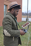 Keith Jacobs watching through the camera as he pilots one of his drones.