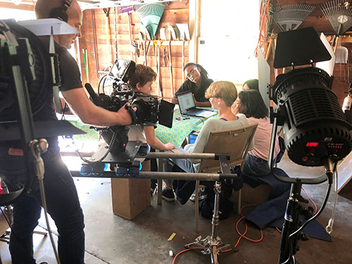 Filming the garage scene from the series where the group is planning their magnetism project. (Image courtesy of Pamela Pena Martin.)