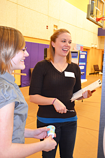 Julia Ossler, Illinois Ph.D. student enjoy the student's presentation.