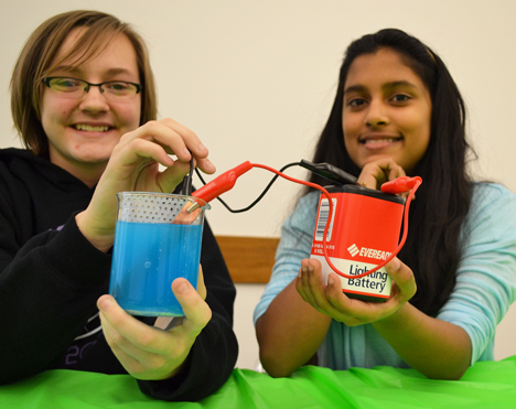 Sophie Quackenbush and Komal Kumaran ready to demonstrate electroplating to NanoDays visitors.