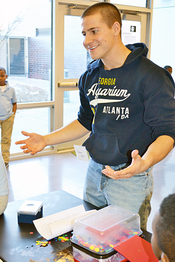 Illinois grad student Adam Wood shares his love of nanoscience with the 3rd graders.