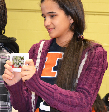 Walkyie Paula plays nutrition bingo with Prairie Elementary students.