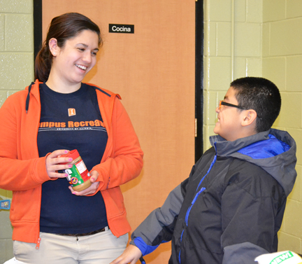 Leila Shinn discusses nutrition with a Prairie Elementary School student.