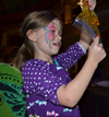 Local youngster appreciates slime she just made in an experiment during a recent REACT outreach event at the Orpheum Children's Science Museum