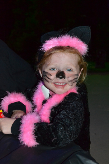 Local youngster enjoys the Orpheum Trick or Treat event waits to participate in a hands-on chemistry experiment.