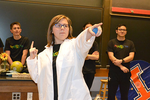 Physics Van coordinator Spencer Hulsey interacts with the Chicago students during one of her group's demos.