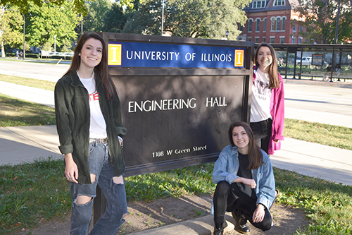 (right to left) Mary, Theresa, and Frances in front of the Engineering Hall sign.