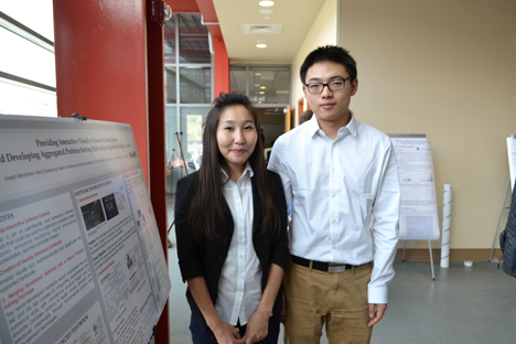Zhelin Chen and Oyuna Angatkina, members of MechSE's SIIP team who are working to incorporate interactive, visually enhanced course delivery via ME 340 and ME 360 staff their poster to answer any questions during the SIIP Poster Showcase.