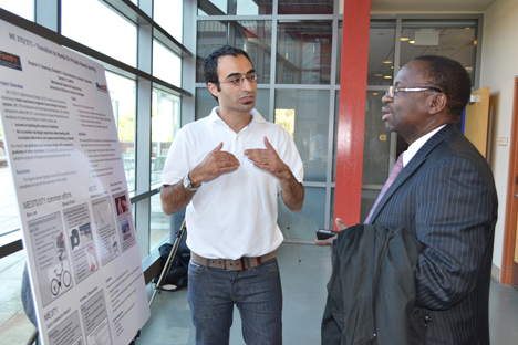 Sameh Tawfick explains the particulars of ME 370 and 371 to Illinois Provost Ilesanmi Adesida.