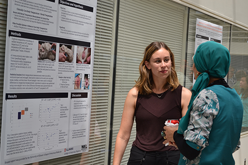 Vet Med student, Ivanna Levy, explains her poster.