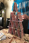 An Engineering Exploration participant exhibits the tower they built as part of the engineering challenge related to Civil Engineering.