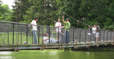 Smart Structures students examine suspension bridge.