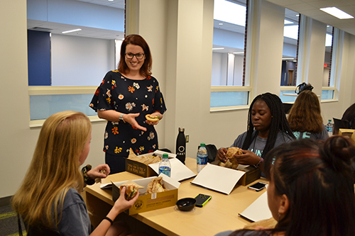 Jenny Amos (second from left) speaking to Bioengineering freshman at the departmental lunch.