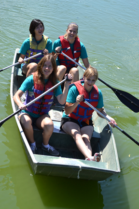 WIE campers canoing.