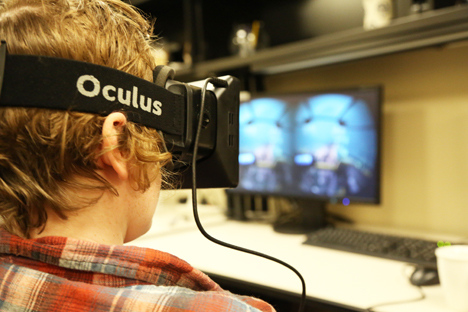 A student using Occulus equipment in the AVL. 