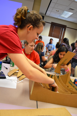 G.A.M.E.S. campers hard at work constructing their solar oven.