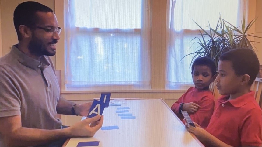 Goddard and his sons demonstrated the game he created to teach students about algorithms.