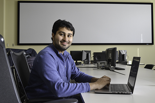 SPIN student Sujay Shah at work in the SPIN office in NCSA. Also mentored by Dr. Andre Schleife, Shah is working on the virtual reality aspect of a project about data vizualization for Schleife's Material Science course.