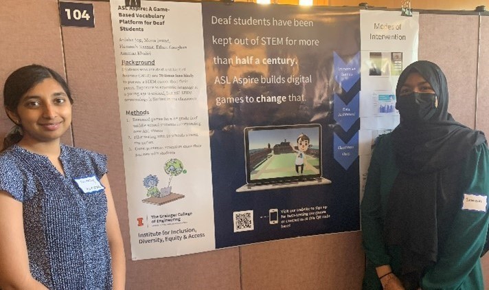 University of Illinois students Anisha Jog and Sumayyah Hussain stand by their presentation on the ASL STEM Vocabulary App.