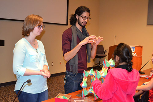 Ashley Knoerdel and Adnan Choudhary interact with third graders.