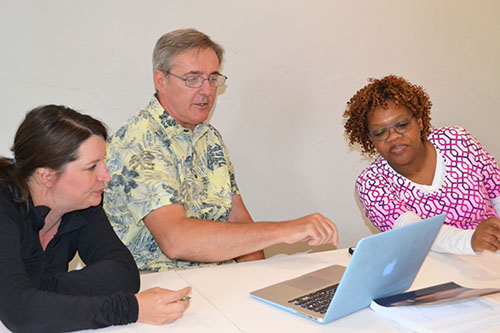 Irica Baurer, Goode arts instructor; Terry Koker, Mahomet-Seymour science teacher; and Anita Alicea, Goode STEM integration specialist, discuss how to go about an activity. 