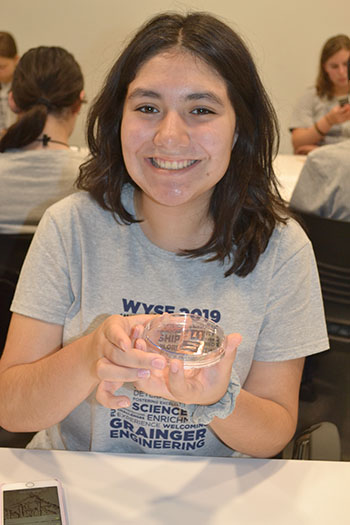 Matilde Figuero-Carrillo shows off her completed solar cell.