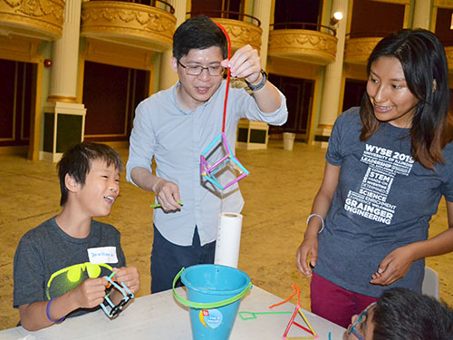 Adriana Carola Salazar Coariti (right), interacts with a youngster at  the Orpheum.