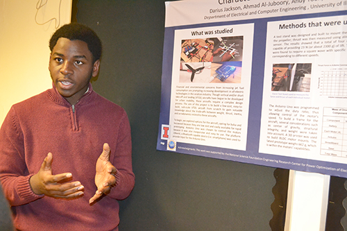 Darius Jackson presents his research to the Champaign School Board.
