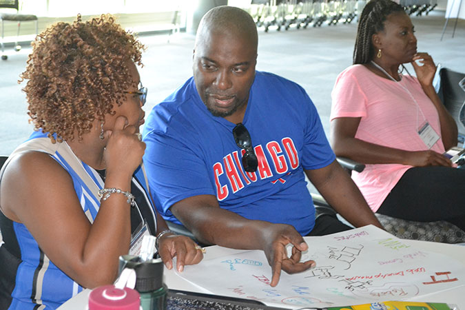  Lemond Peppers and Anita Alicea chat about what they believe their students think STEM is.