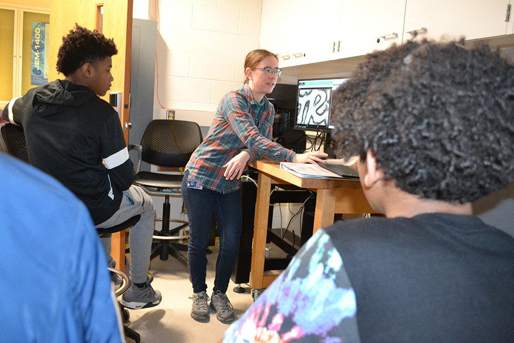 Kathy Walsh teaches Franklin STEAM Academy middle schoolers about scanning probe microscopy during a Franklin  tour of MRL