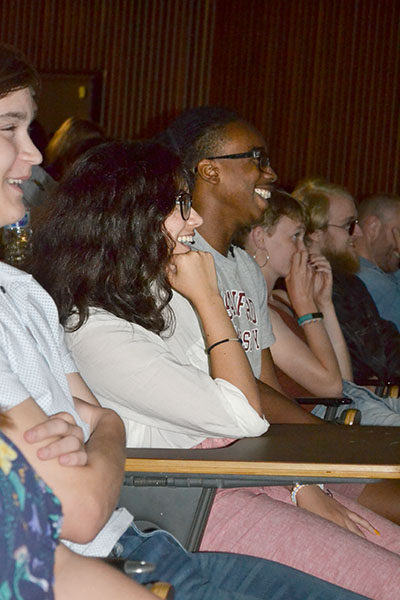 Neenah Williams (second from the left) and Asim Baraka (third from the left) appreciate one of the episodes.