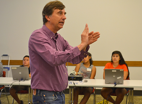 Joe Muskin explains  3D printing to the young participants.