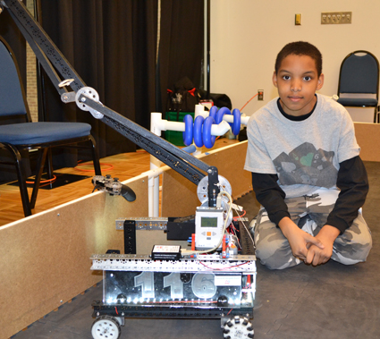 Participant displays his large robot.
