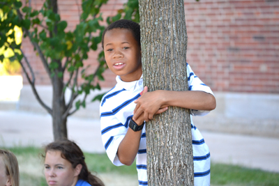 Youngster watches during radio-controlled models demonstration.