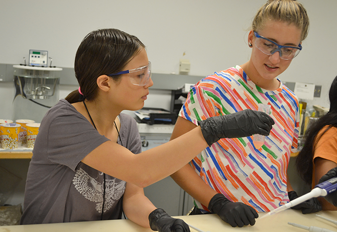 A camper learns about how to work with biomaterials during one of the camp's hands-on sessions.